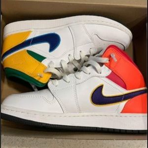 Size 6Y Air Jordan Mid Near perfect condition.  Kept in box